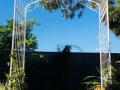 Custom garden arch with wrought iron on front and back.