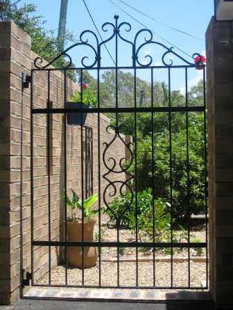 Hand forged wrought iron courtyard gate