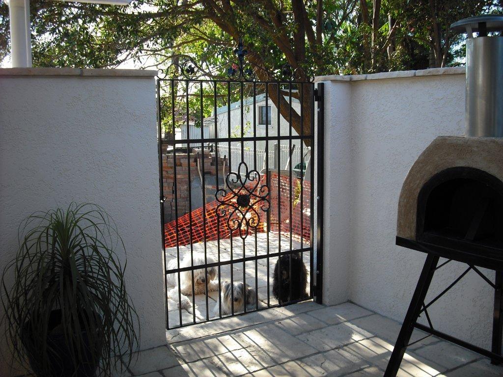 Dog friendly wrought iron courtyard gate