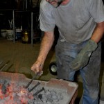 Adelaide Hills blacksmith Andrew Hood needs to work quickly when several pieces of steel are heating up in his forge.